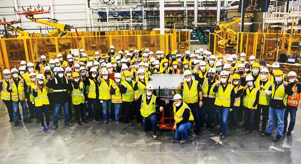 Group of plant individuals who produced the first battery tray at MEVS