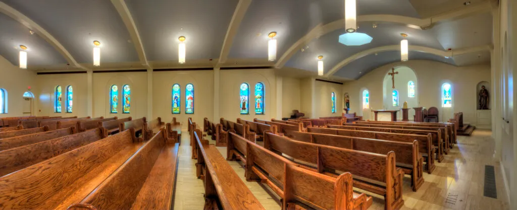 Lansing Catholic High School nave pews
