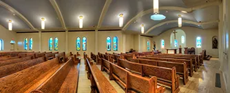 Lansing Catholic High School nave pews