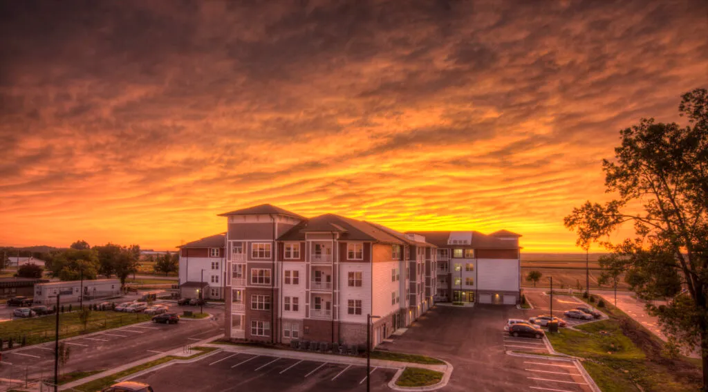 Apartment block exterior at sunset