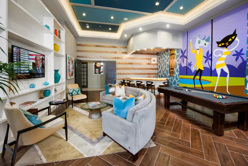 Apartment front office common area with seating and pool tables