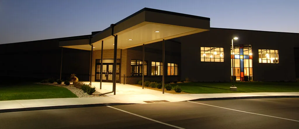 Hopevale exterior front entrance and stained glass window