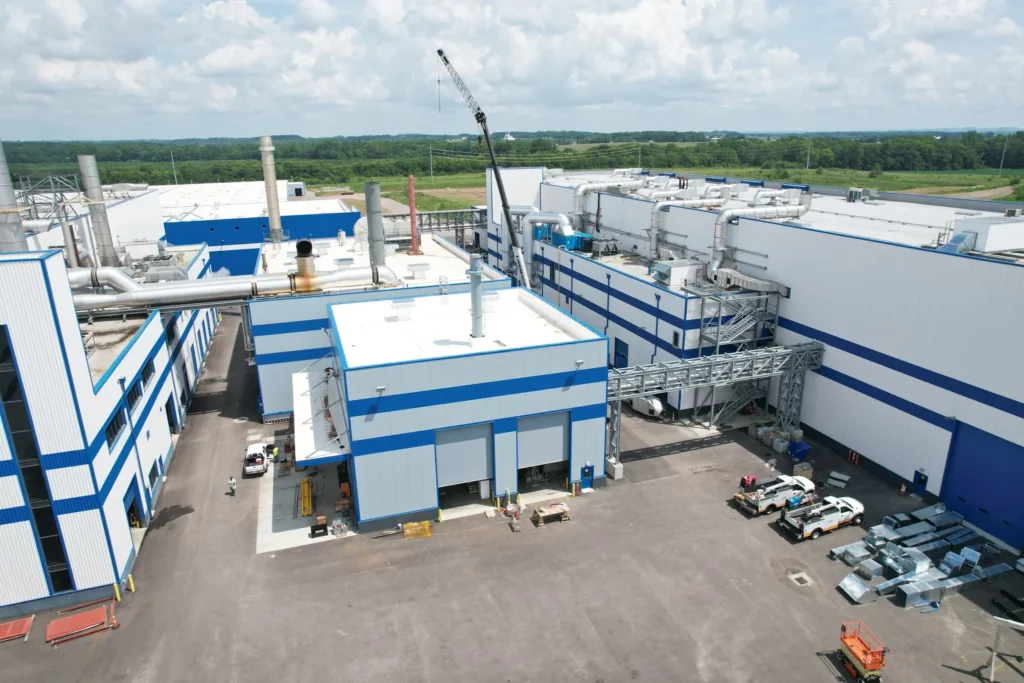 Industrial building with blue and white walls, showcasing the Sofidel Group facility located in Circleville, Ohio.