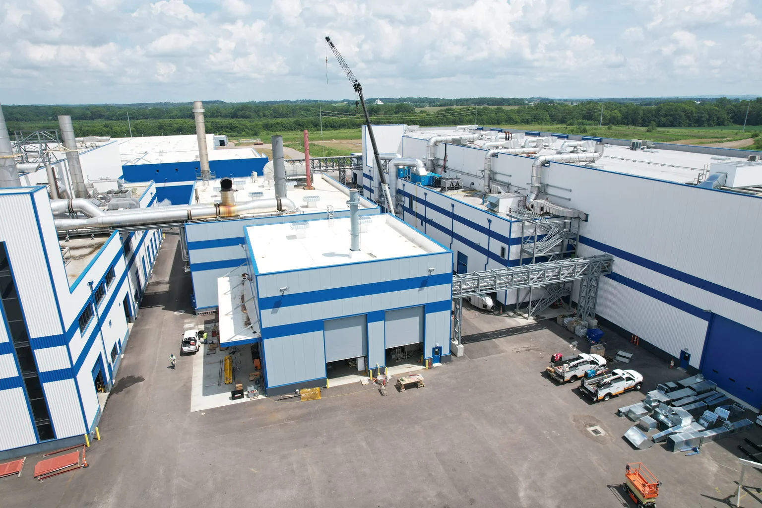 Industrial building with blue and white walls, showcasing the Sofidel Group facility located in Circleville, Ohio.