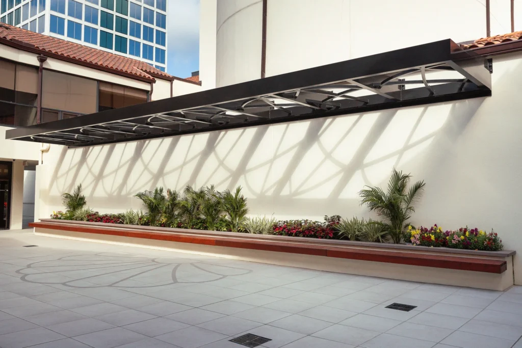 St. James Catholic Church in Orlando, FL, showcasing a white exterior and a large window.