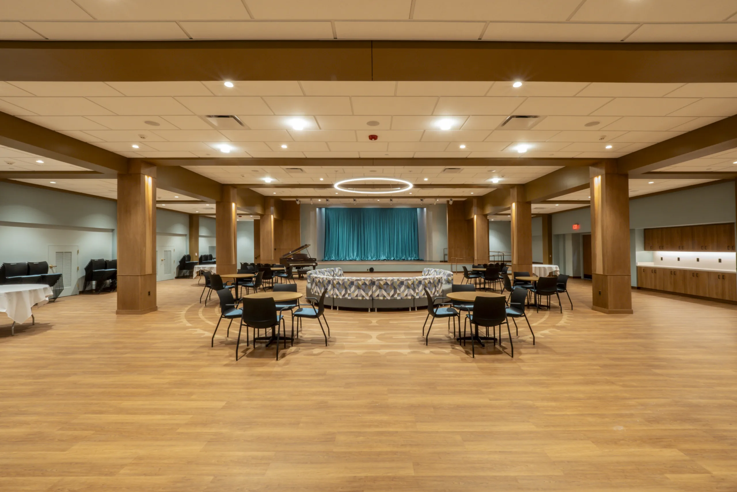 Photo showing the lower-level social hall and the unique labyrinth floor pattern of The People's Church. 