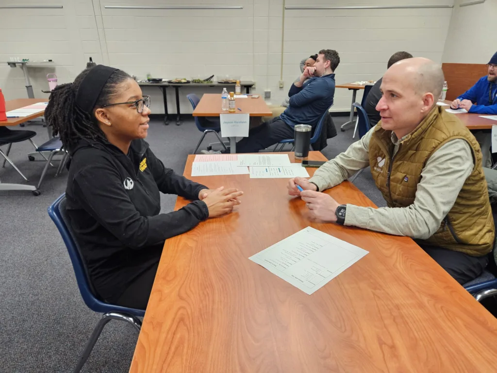 Student meeting with WIELAND's Regional Director to discuss their cover letter and résumé