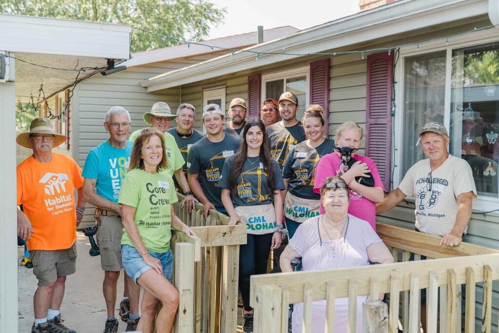 Group gathered on the recently constructed accessibility ramp