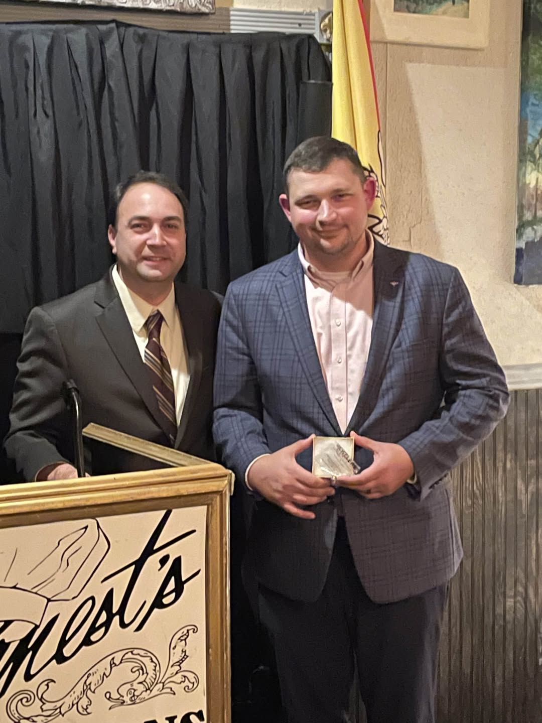 Two men gathered for a photo during the Volunteer of the Year award ceremony
