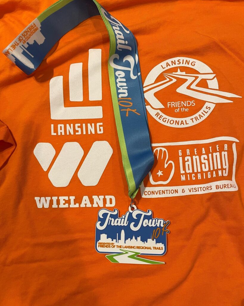 Photo of the tshirt and medals handed out to the runners