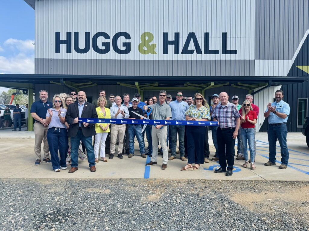 Celebrating the grand opening of Hugg & Hall with a ribbon cutting ceremony