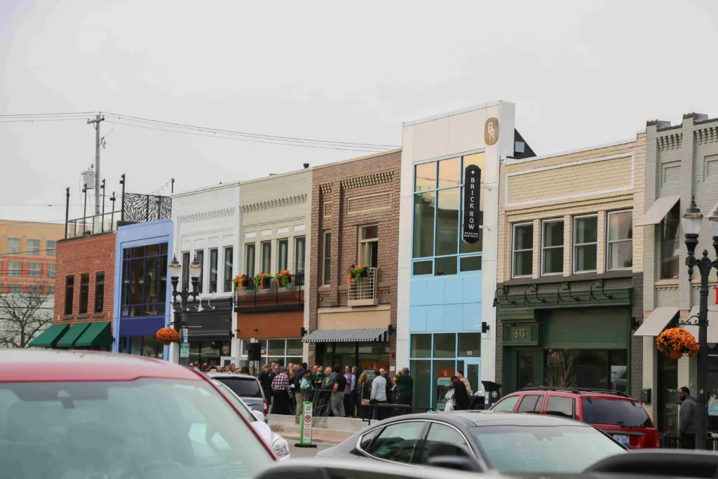 Exterior view of the Brick Row project. Six buildings constructed with upper floor living and lower level commercial space. 